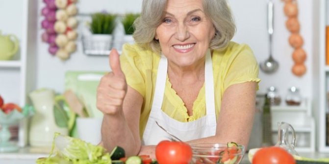 Elderly woman in the kitchen